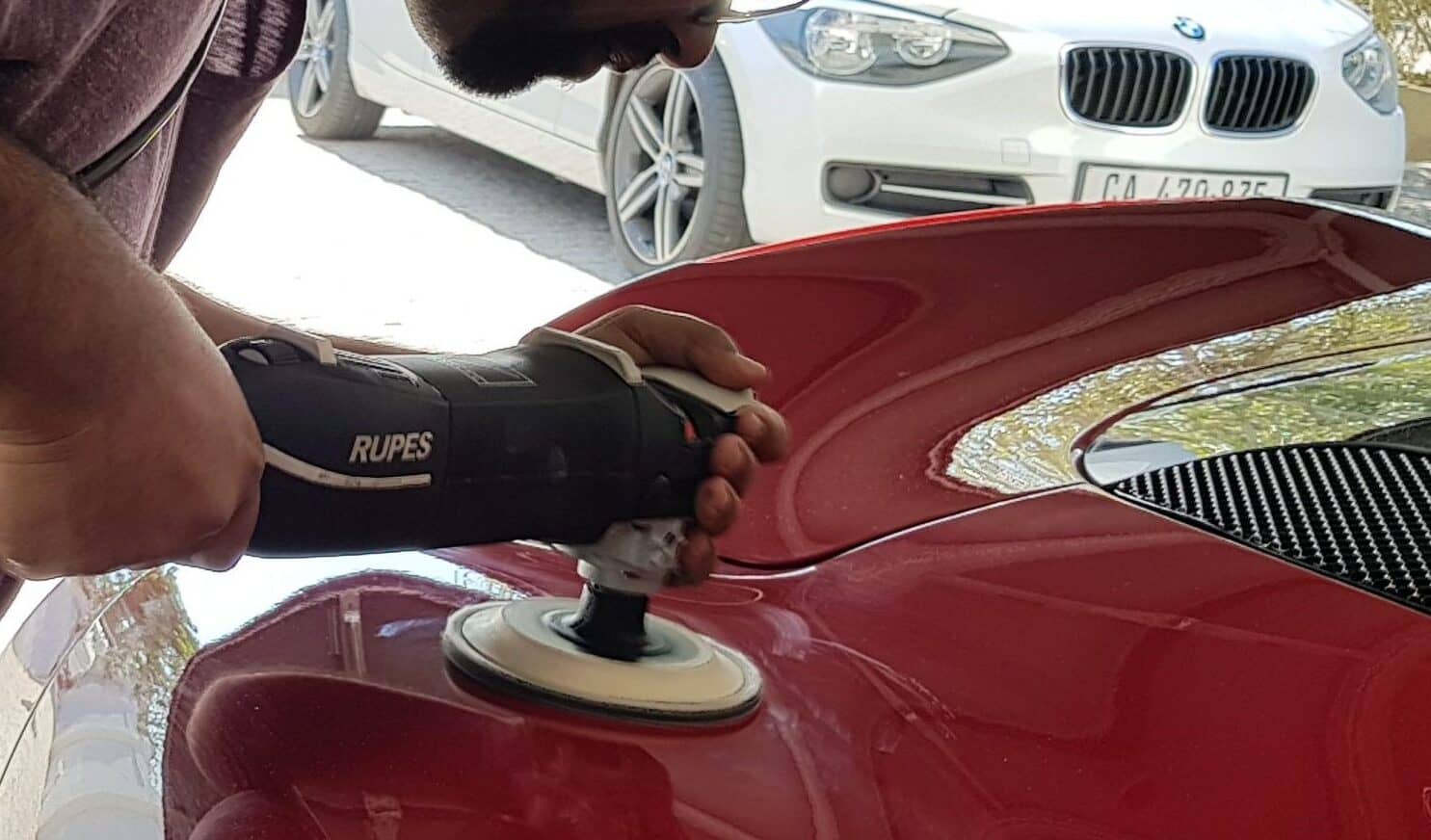 Photo of Qiyaam from Protouch Auto Detail Correction Polishing a Red Alfa Romeo 4C with a Rupes Rotary