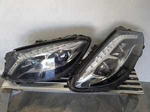 Mercedes S-Class headlights needing restoration from deep stone chips and pitting