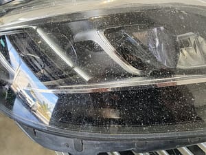 Mercedes S-Class left hand side headlight needing restoration from deep chips and pitting