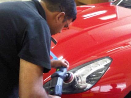 Qiyaam from Protouch Car Care doing headlight restoration on a Ferrari California